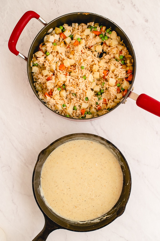 Cream sauce and mixed ingredients to make chicken pot pie