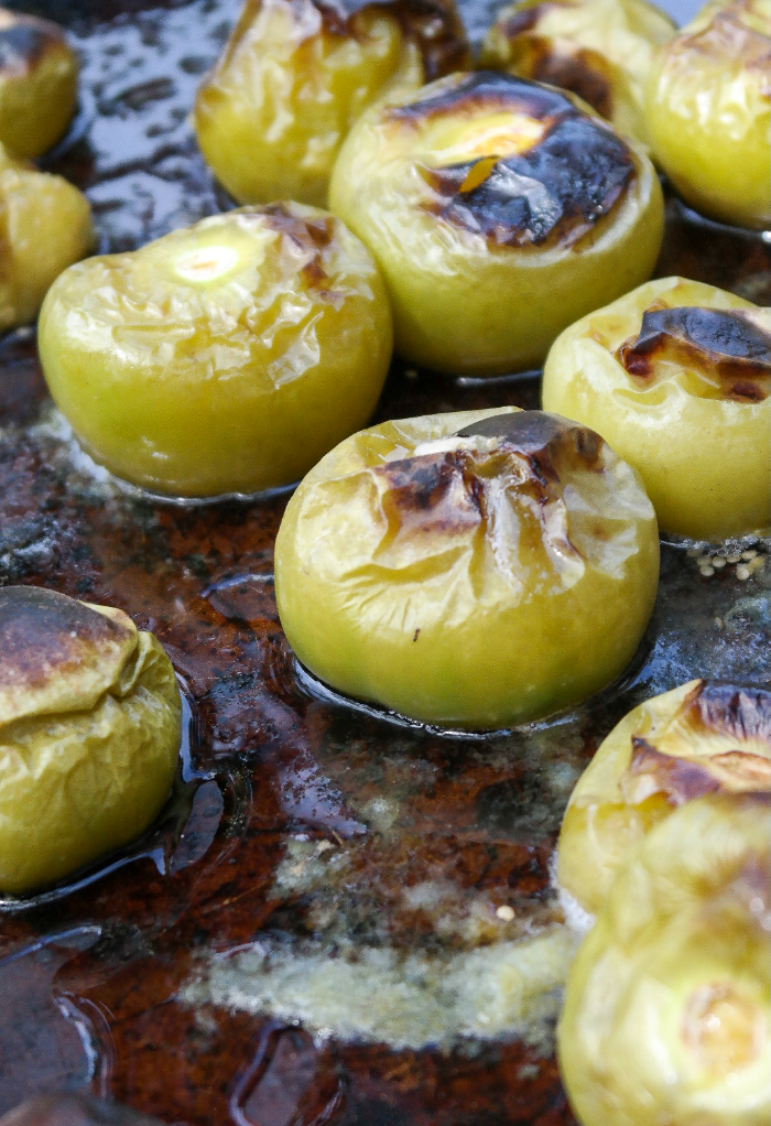 Roasted tomatillos in the oven to make salsa verde. 