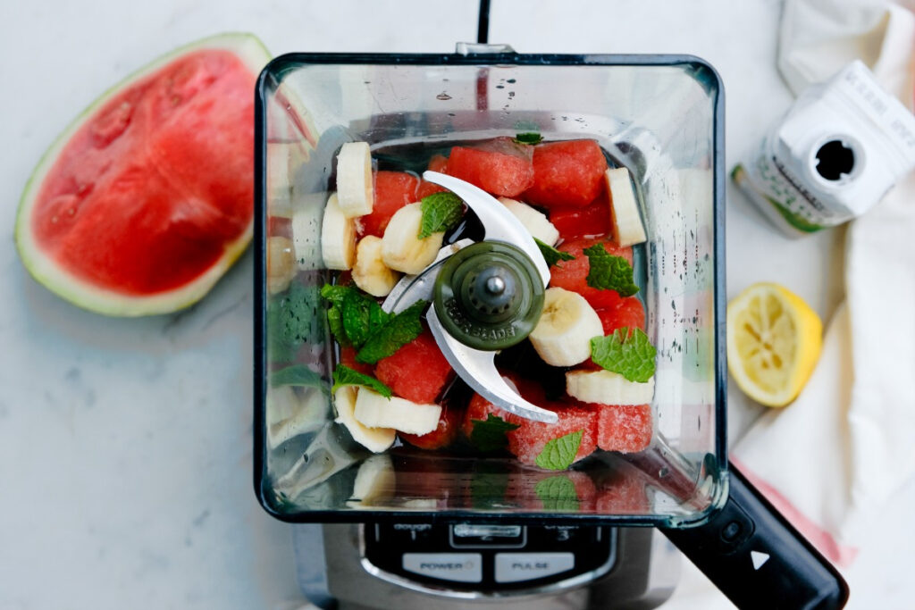 Diced watermelon, bananas, mint and coconut water in a  blender. 