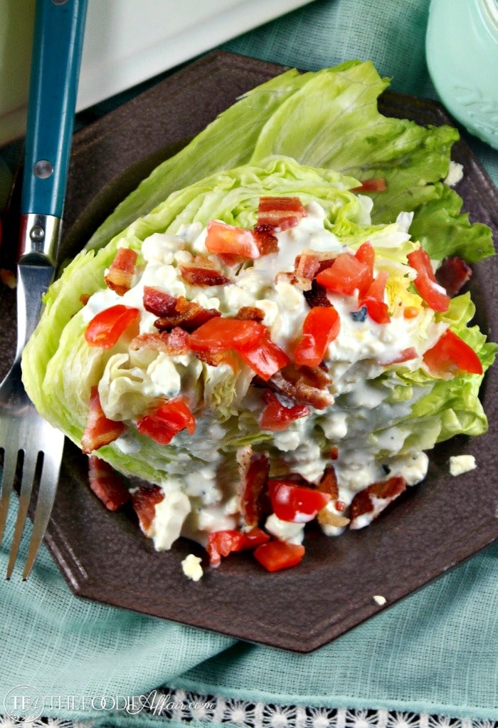 This wedge salad with blue cheese dressing is a meal in itself when topped with bacon and tomatoes! The dressing is also great for dipping vegetables for a snack! The Foodie Affair