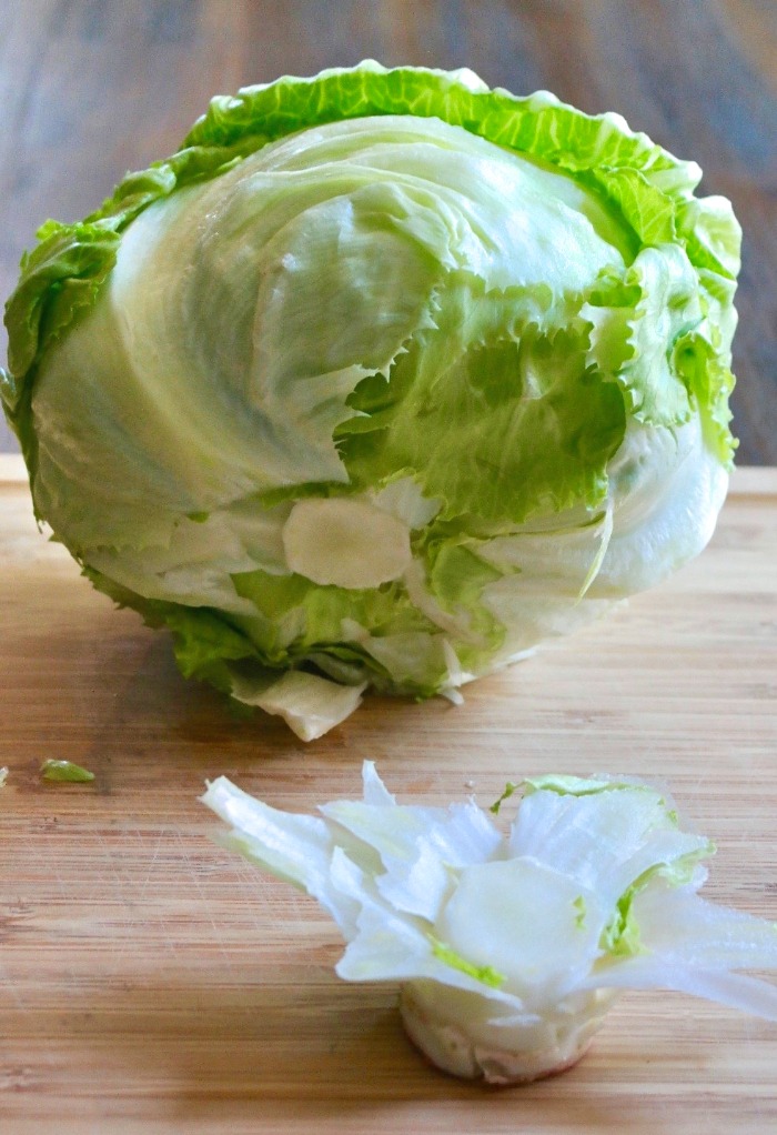 Cut the stem of the lettuce close to the head for wedges