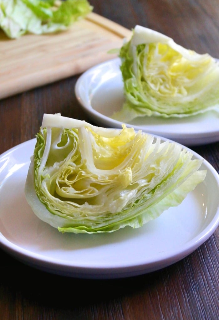 Lettuce wedge on a white plate