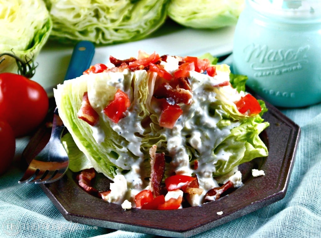This wedge salad with blue cheese dressing is a meal in itself when topped with bacon and tomatoes! The dressing is also great for dipping vegetables for a snack! The Foodie Affair