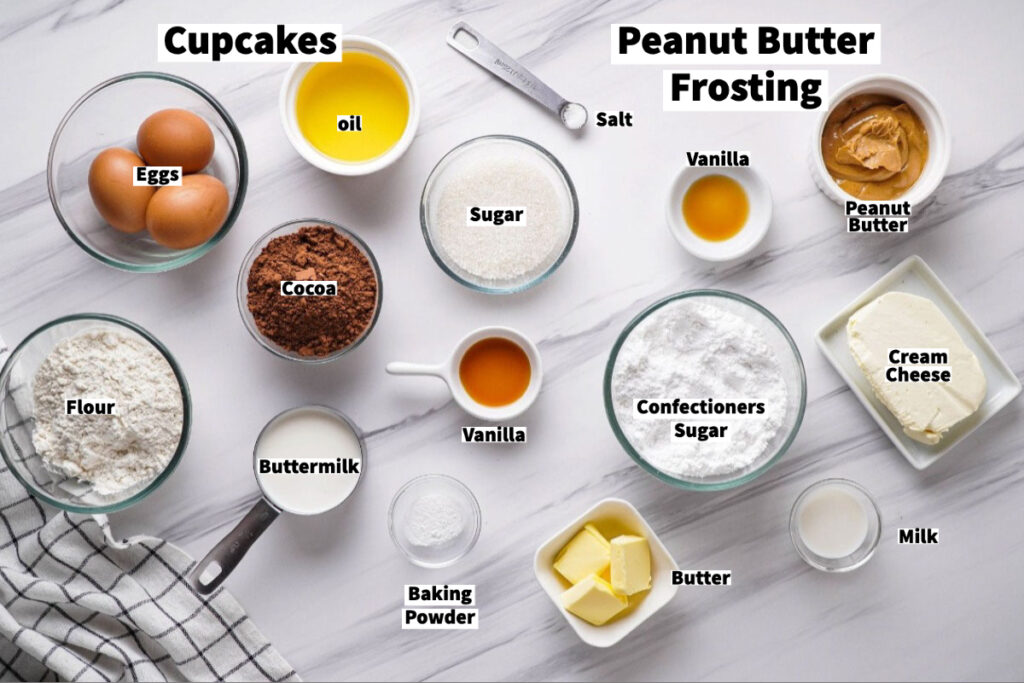 Ingredients to make chocolate cupcakes with peanut butter frosting. 