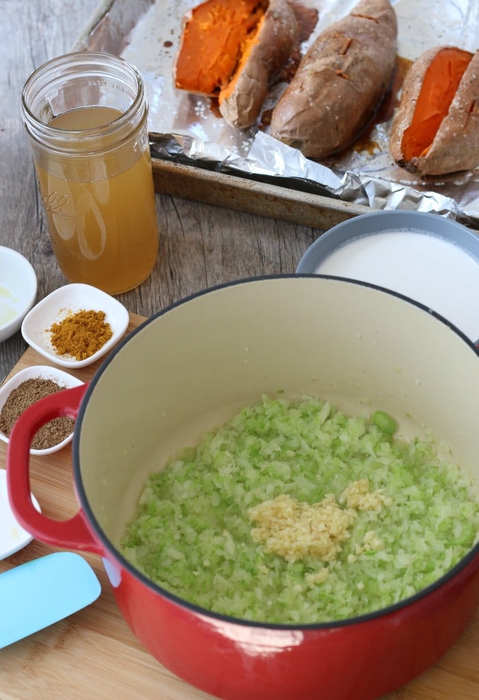 Garlic and celery in the bottom of the pot ready to be made into my tasty sweet potato soup recipe. 