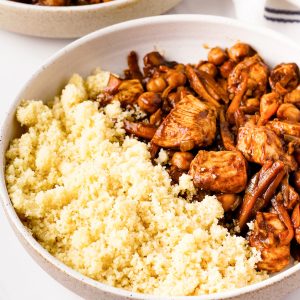 Chickpea stew with quinoa in a white serving bowl.