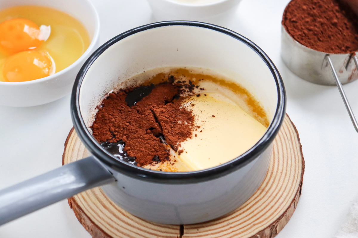Sauce pan with chocolate and butter melting together. 