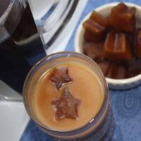 Top view of coffee with coffee iced cubes.