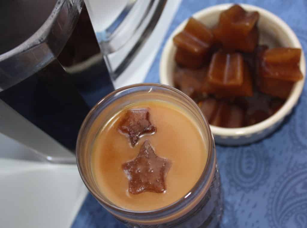 Top view of coffee with coffee iced cubes.
