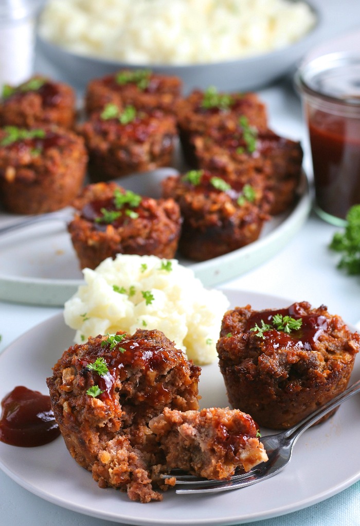 Here we see a serving of the meatloaf with great meatloaf seasoning on a plate ready to eat.