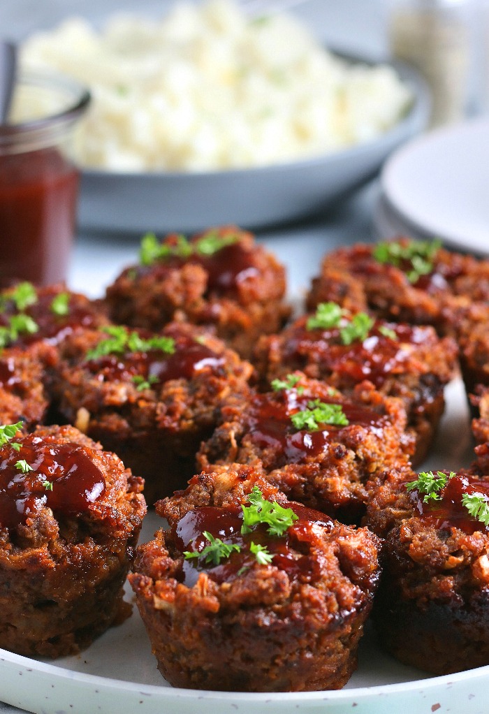 A close shot of the whole batch of easy meatloaf recipe made in muffin cups!