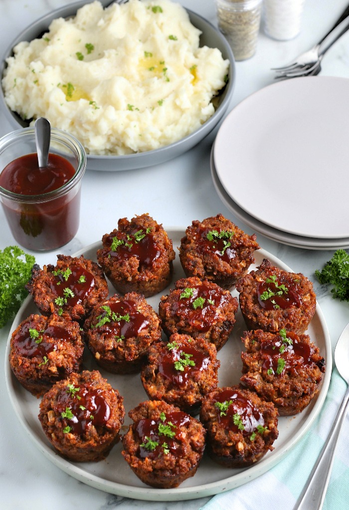 A top down look at the batch of mashed potatoes and the finished result of our how long do you bake meatloaf tutorial.