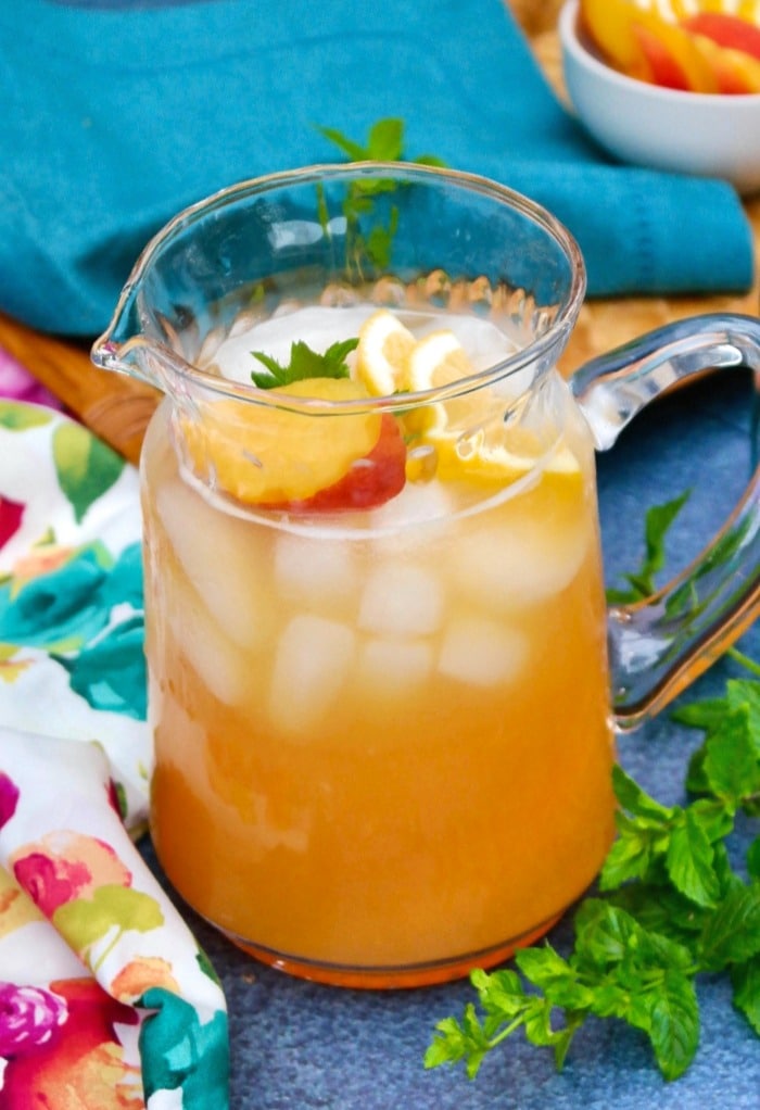 Pitcher filled with fresh peach lemonade