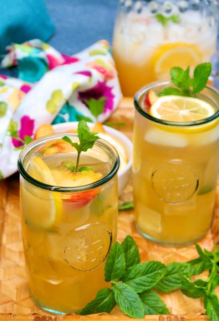 Glasses of fresh homemade peach lemonade. 