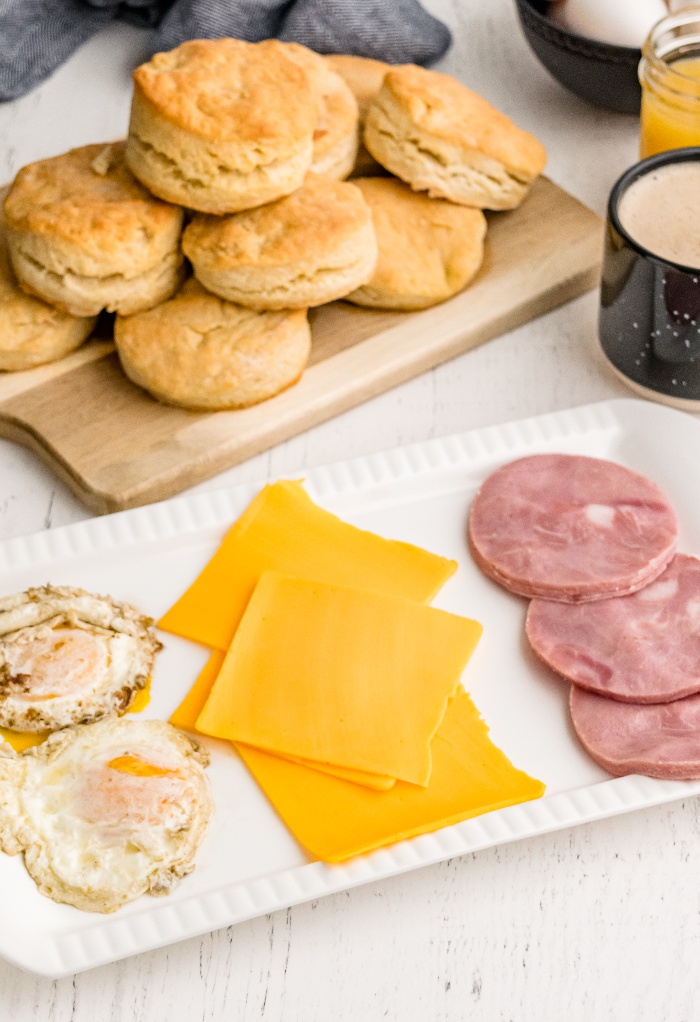 Ingredients to make breakfast biscuits with egg and cheese..