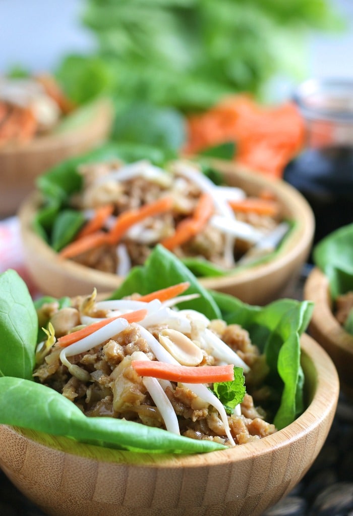 This is a close up photo of the turkey lettuce wraps served in little bowls, ready to be enjoyed. 