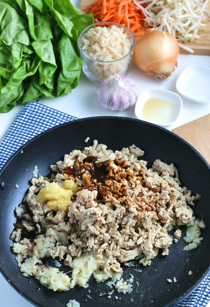 This is the third step for learning how to make lettuce wraps where we season the meat. 