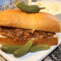 Shredded BBQ Chicken Crockpot Recipe made with your favorite pre-made sauce. #slowcooker #crockpot #chicken | www.thefoodieaffair.com