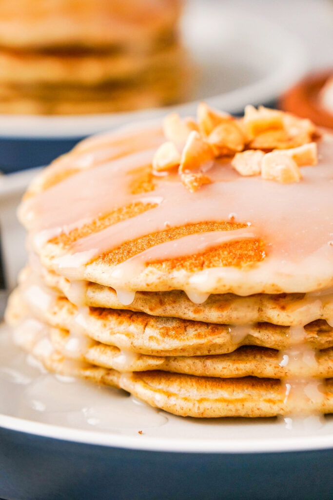Macadamia nut pancakes topped with coconut syrup. 