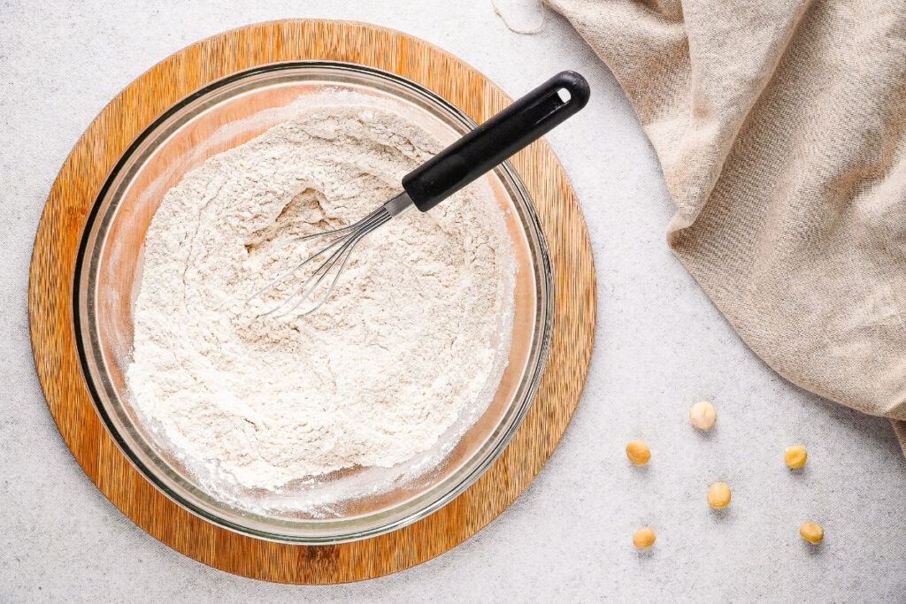 Dry ingredients in a mixing bowl for pancakes. 