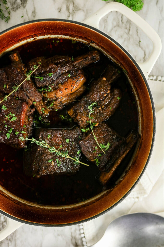 Short ribs baked in a Dutch oven.