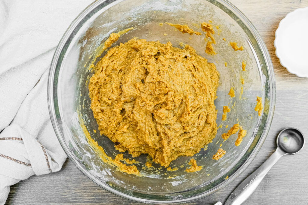 Pumpkin scone dough in a mixing bowl. 