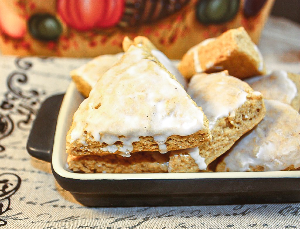 Pumpkin scones in a black ceramic tray. 