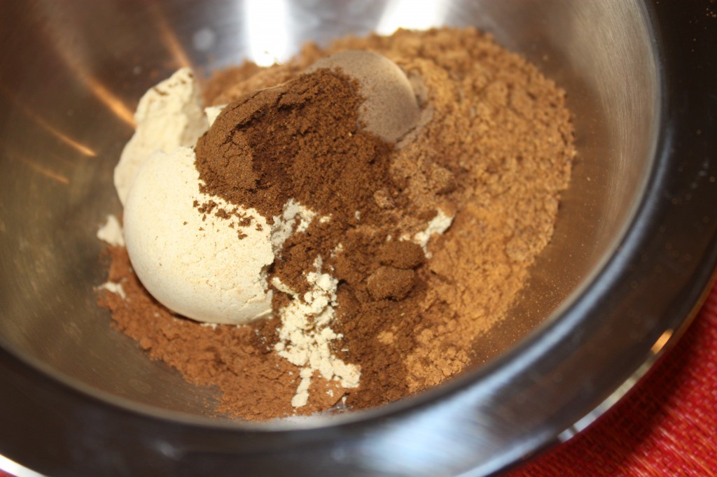 all ingredients for pumpkin pie spice in a stainless steel bowl