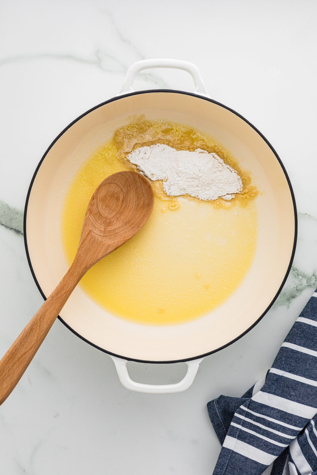 A large sauce pan with melted butter and flour.