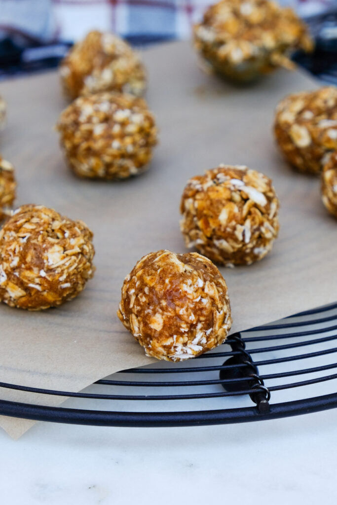 Oatmeal rolled with pumpkin puree on a baking rack. 