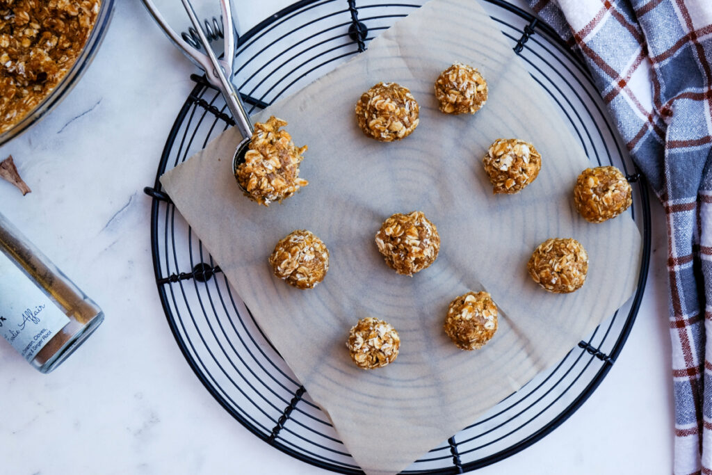 no-bake protein treats on a baking rack.