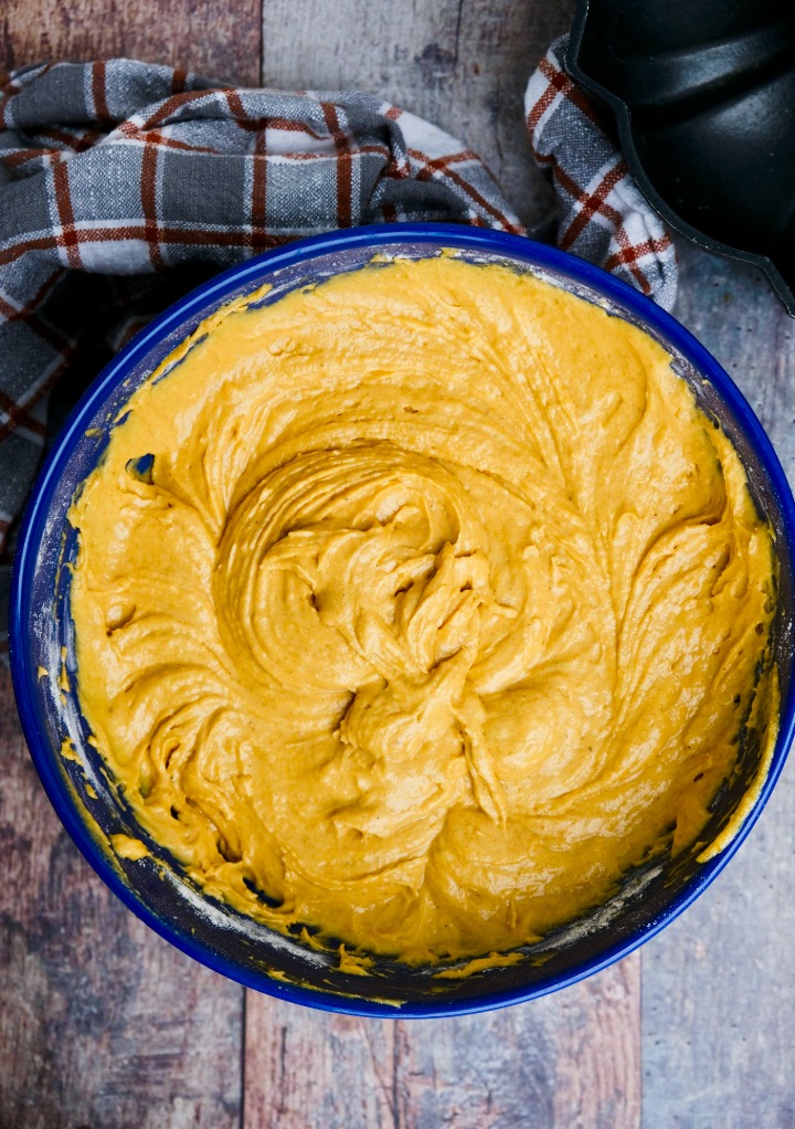 Wet and dry ingredients pumpkin bundt cake batter.