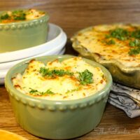 Shepherd's Pie in small green ramekin dishes.