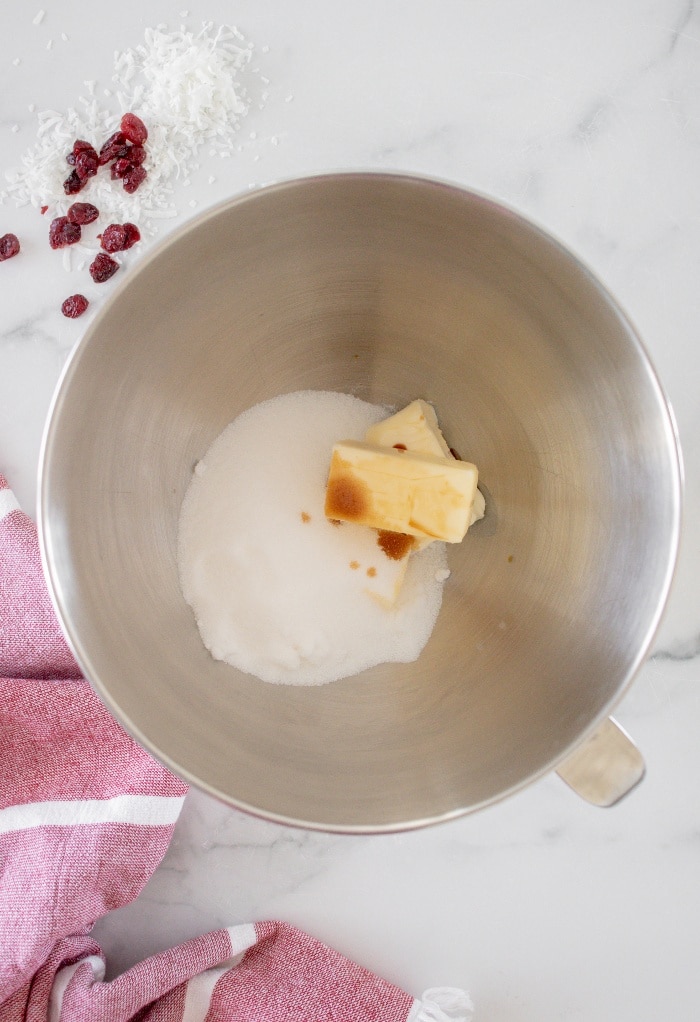 Here is a large mixing bowl with butter and sugar. 