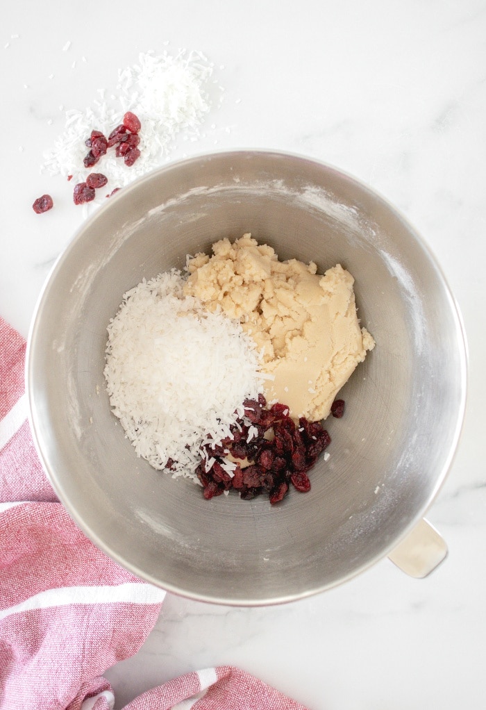 Here we fold in the cranberries and coconut flakes in the cookie batter.