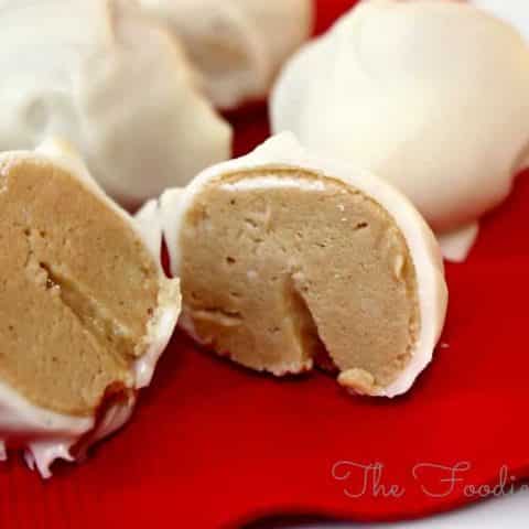 Peanut Butter covered in white chocolate on a red napkin