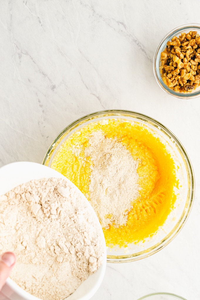 Adding flour to butter mix.