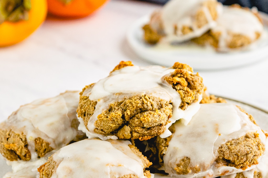 close view of cookies topped with powder sugar glaze.