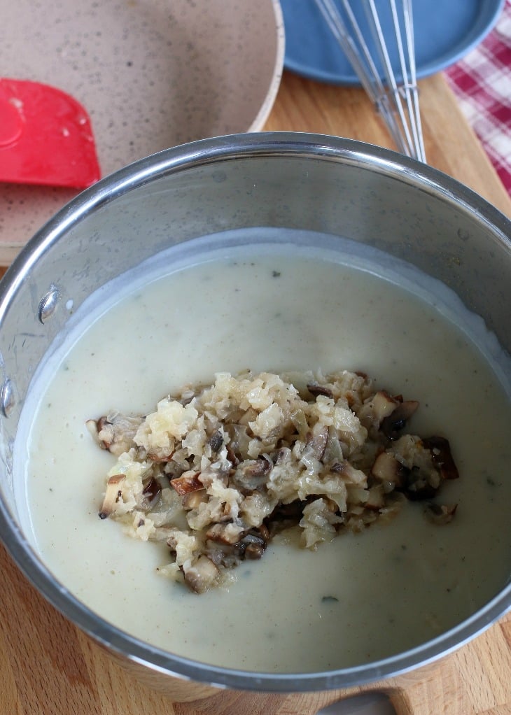 Saute'ed mushrooms added to the thickened base of cream of mushroom soup.
