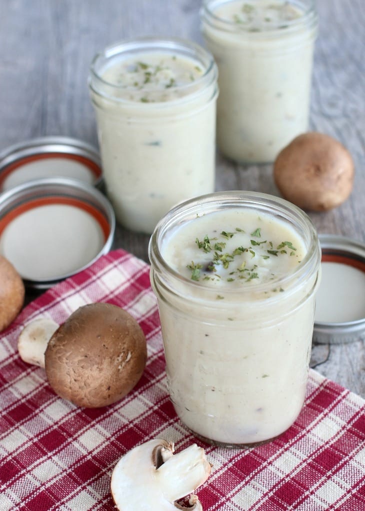 Cream of mushroom soup stored in mason jars for using in homemade recipes.