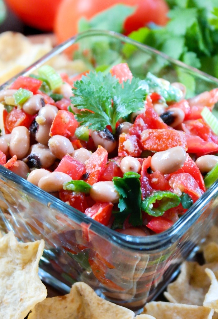 Close view of Black-eyed pea dip in a clear bowl.