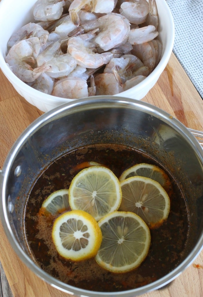 Fresh lemons added to a shrimp marinade.