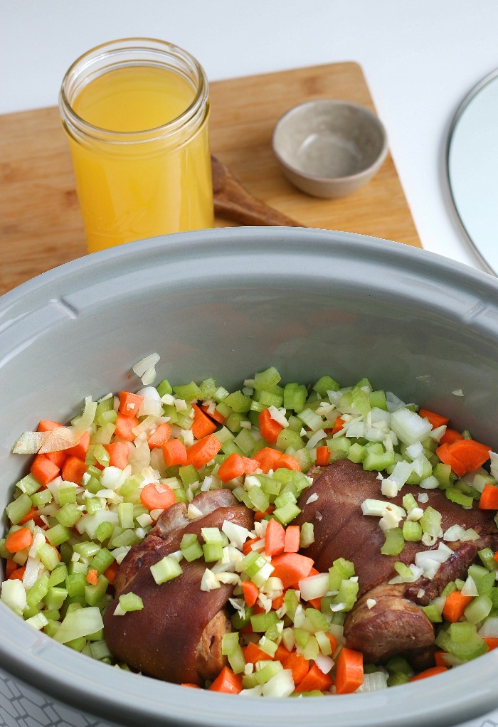 Everything is added to the crockpot before we begin cooking the slow cooker ham and beans recipe. 