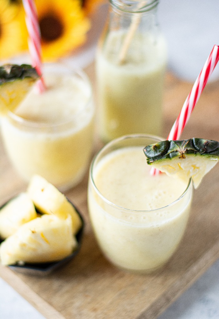 Clear glasses filled with pineapple smoothies