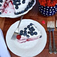 Berry Tiramisu Cake on a white plate