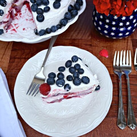 Berry Tiramisu Cake on a white plate
