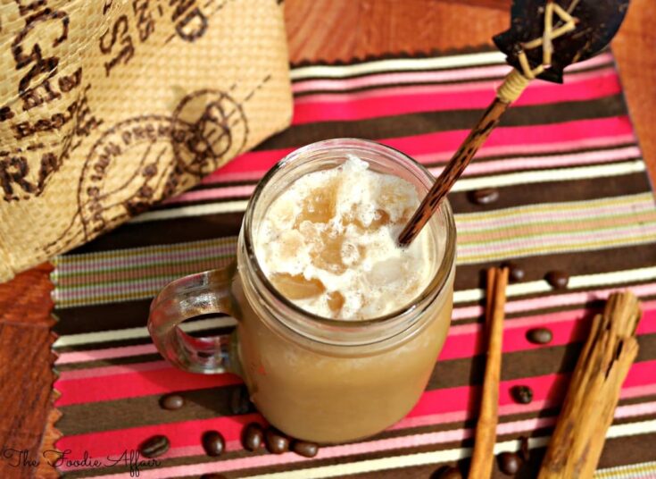 Homemade frosty cappuccino in a mason jar ready to be drank