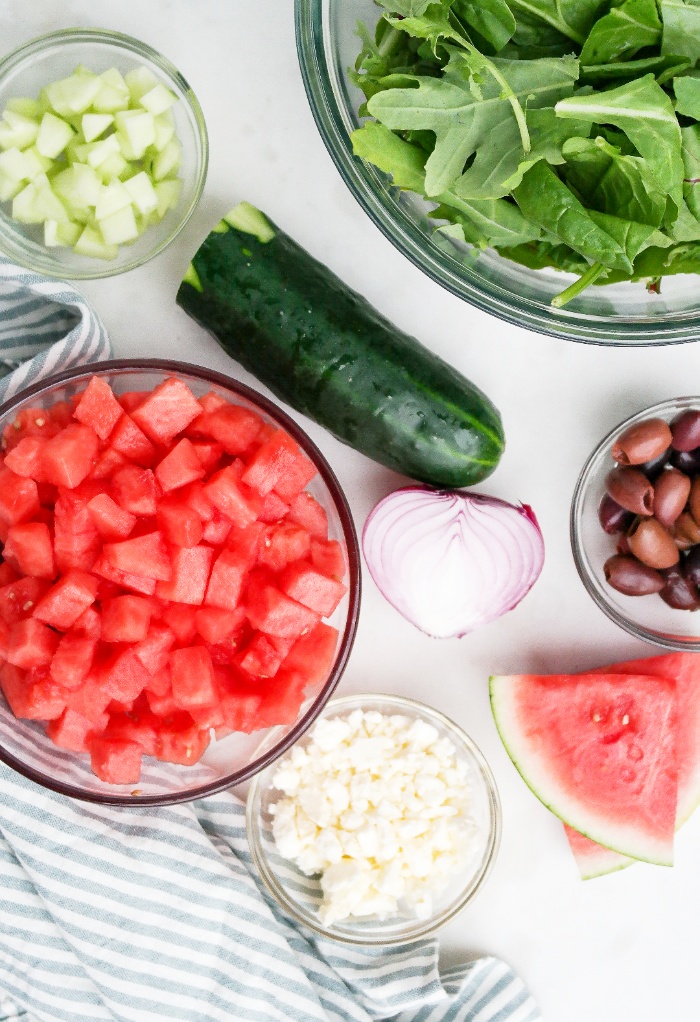 Ingredients for a watermelon salad with feta.