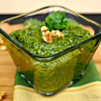Healthy and simple Basil Pesto with Walnuts, a rich sauce that can be eaten with bread and crackers or tossed onto cold or hot pasta.
