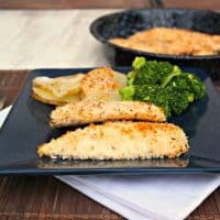 Baked Chicken Tenders on a black serving plate